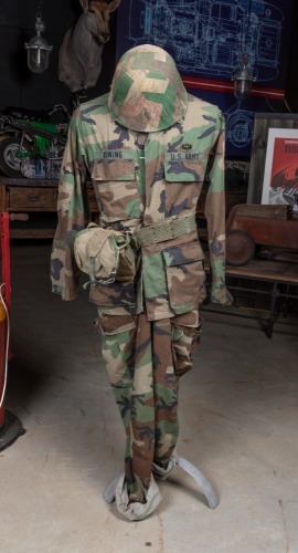 US ARMY: A US army Special Forces Green Beret uniform, with helmet, belt and water bottle holder