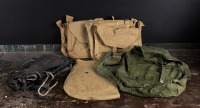 MILITARY BAGS: A collection of vintage military haversacks, together with a group of gaiters