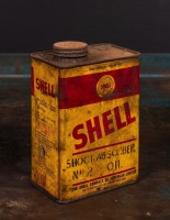SHELL: A Shell one quart shock absorber oil tin