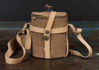 WWII: An Australian WWII blue enamel two pint water bottle with cork stopper, in wool felt cover and leather carrier, cork is slightly perished