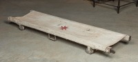 STRETCHER: A vintage military timber and canvas stretcher on wheels with pull out timber handles - 3