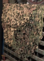 CAMOUFLAGE: A camouflage net, approx 200cm square