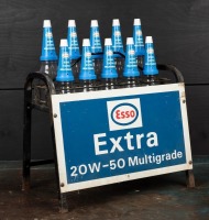 ESSO: A circa 1970s "Esso Extra 20W-50 Multigrade 10 bottle set and stand