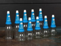 ESSO: A circa 1970s "Esso Extra 20W-50 Multigrade 10 bottle set and stand - 3
