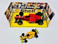 FORMULA 1: A 1:20 scale model by Masito of the Ferrari F310 together with a 1:43 scale Lotus F1 car [Location: Sydney] - 2