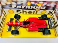 FORMULA 1: A 1:20 scale model by Masito of the Ferrari F310 together with a 1:43 scale Lotus F1 car [Location: Sydney] - 4