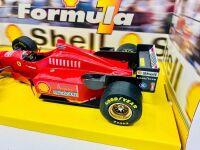 FORMULA 1: A 1:20 scale model by Masito of the Ferrari F310 together with a 1:43 scale Lotus F1 car [Location: Sydney] - 5