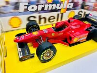 FORMULA 1: A 1:20 scale model by Masito of the Ferrari F310 together with a 1:43 scale Lotus F1 car [Location: Sydney] - 6