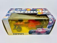 FORMULA 1: A 1:20 scale model by Masito of the Ferrari F310 together with a 1:43 scale Lotus F1 car [Location: Sydney] - 7