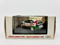 TOYOTA: A 1:43 scale model by Vitesse of the Toyota Corolla WRC from the 1998 Rally Sanremo, limited edition 2172/2500, complete certificate of authenticity and original packaging [Location: Sydney] - 7