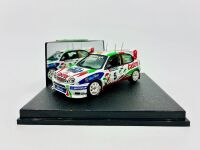 TOYOTA: A 1:43 scale model by Vitesse of the Toyota Corolla WRC from the 1998 Great Britain Rally, limited edition 2273/2500, complete certificate of authenticity and original packaging [Location: Sydney] - 2