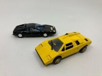 SUPER CAR: A pair of 1:43 die cast scale models from Japan including the Lamborghini Countach LP400 and Ferrari 365 GT4 BB, together with a Burago 1:64 die cast Lamborghini Aventador LP700-4 in original packaging [Location: Sydney]