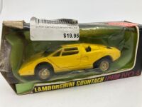 SUPER CAR: A pair of 1:43 die cast scale models from Japan including the Lamborghini Countach LP400 and Ferrari 365 GT4 BB, together with a Burago 1:64 die cast Lamborghini Aventador LP700-4 in original packaging [Location: Sydney] - 3