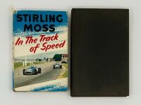 STIRLING MOSS: A pair of hardcover books including "Stirling Moss: In the Track of Speed" and "A Turn at the Wheel" - 2