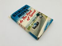 STIRLING MOSS: A pair of hardcover books including "Stirling Moss: In the Track of Speed" and "A Turn at the Wheel" - 3