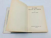 STIRLING MOSS: A pair of hardcover books including "Stirling Moss: In the Track of Speed" and "A Turn at the Wheel" - 4