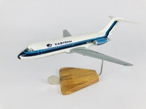 EASTERN AIRLINES: A 30cm long 'Whisper Jet' wooden model, registration 'N8911E'.