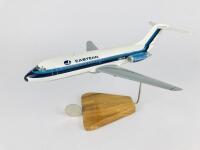 EASTERN AIRLINES: A 30cm long 'Whisper Jet' wooden model, registration 'N8911E'.