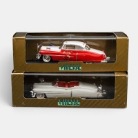 CADILLAC: A pair of 1:43 scale Vitesse models, a Cadillac Eldorado 50 "La Vache Qui Rit" in red, also a Cadillac Eldorado 53 "continental kit" in off white