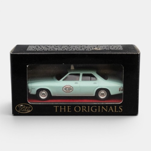 HQ BELMONT: A Trax 1:43 scale Holden HQ Belmont sedan model, finished in an aqua paintwork with the Frankston radio cabs livery, part of the Aussie taxi series of models, model number TR17K