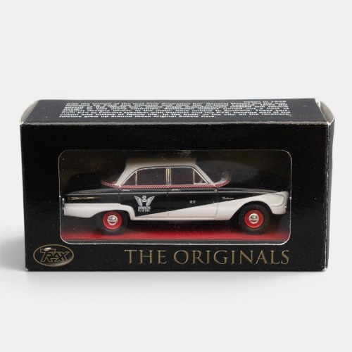XK FALCON: A Trax 1:43 scale Ford XK Falcon sedan model, finished in black & white paintwork with the Associated taxis livery, part of the Aussie taxi series of models, model number TR26G