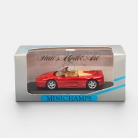 FERRARI: A 1:43 scale Minichamps 1994 Ferrari F355 spider model, finished in red paintwork, model number 430 074032