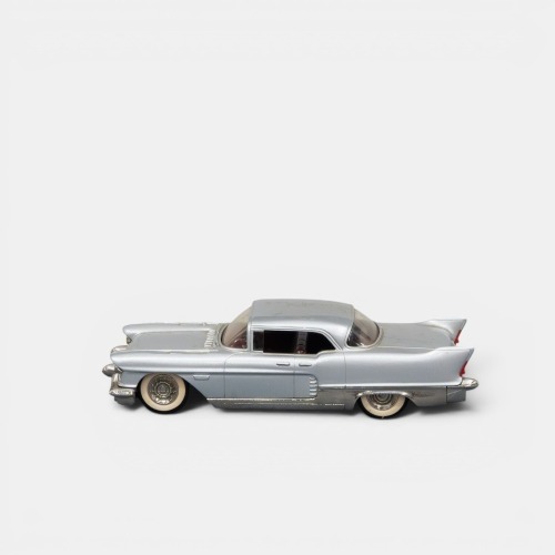 203 · CADILLAC: A 1:43 scale Brooklin collection 1957 Cadillac Eldorado Brougham model, a white metal model finished in grey paintwork, model number BK 27, made in England