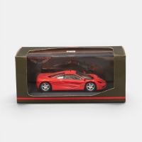 McLAREN: A 1:43 scale Minichamps McLaren F1 roadcar model, finished in red paintwork, comes in genuine McLaren packaging, model number 530 133432