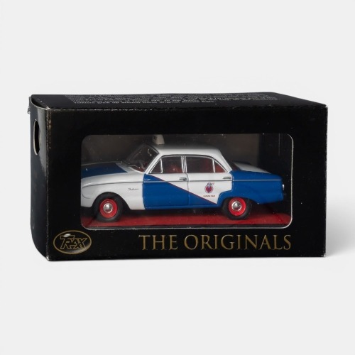 XK FALCON: A Trax 1:43 scale Ford XK Falcon sedan model, finished in white and blue paintwork with the Legion cabs livery, part of the Aussie taxi series of models, model number TR26F