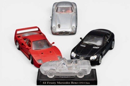 MERCEDES / FERRARI: Four 1:18 scale Mercedes-Benz & Ferrari unboxed models