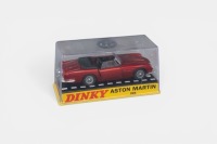 ASTON MARTIN: A Dinky toys Aston Martin DB5 model, finished in dark red paintwork, this is an Atlas edition, model number 110 - 2