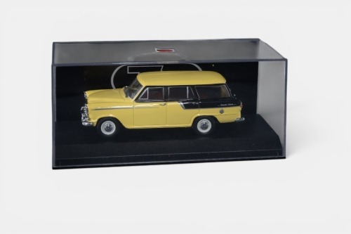 34 · FC HOLDEN: A Trax 1:43 scale Holden FC wagon model, finished in yellow and black paintwork, model number TR90B