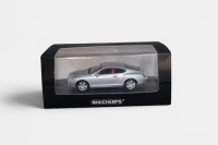 BENTLEY: A 1:43 scale Minichamps Bentley Continental GT model, finished in silver paintwork, in a special unique Bentley sleeve, model number 436 139020