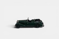 JENSEN: A 1:43 scale Lansdowne models 1937 Jensen dual cowl phaeton model, a white metal model finished in dark green paintwork, model number LDM 27, made in England - 2
