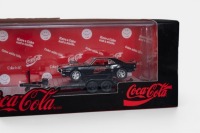 CHEVROLET: A 1:64 scale M2 hauler set of models, consisting of a 1973 Chevrolet K5 Blazer with a 1968 Pontiac Firebird on a trailer, all wearing the iconic Coca-Cola livery, model number TW18, limited edition 8400 pieces - 3