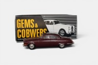 JAGUAR: A 1:43 scale Gems & Cobwebs 1961-1966 Jaguar Mk X model, a white metal model finished in maroon paintwork, model number GC11, made in England - 2