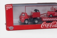 DODGE: A 1:64 scale M2 hauler set of models, consisting of a 1969 Dodge L600 truck with a 1941 Willys coupe on the flat bed trailer, all wearing the iconic Coca-Cola livery, model number TW14, limited edition 8400 pieces - 2