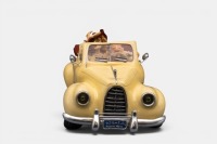 A limited edition (No.85004) resin sculpture by Guillermo Forchino titled 'Le Cabriolet' featuring a distinguished couple driving in there convertible, measures approximately 35cm in length, 15cm width, in as-new condition, within box - 3