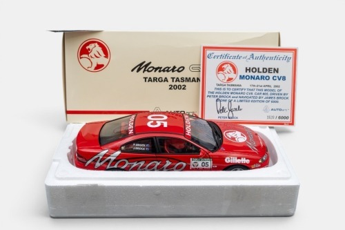 93 · HOLDEN: A 1:18 scale Biante model cars model, this is a Holden V2 Monaro as raced during the 2002 Targa Tasmania rally, the number 05 father and son combination of Peter Brock - James Brock, the Monaro liveried rally car, comes with a signed by Peter Brock certificate of authenticity, limited edition 1620/6000 pieces produced, model number 80261