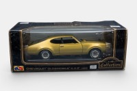 OLDSMOBILE 442: A 1:18 scale 1969 Oldsmobile 442 model, made by TL models - 2