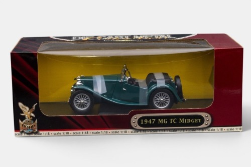 MG TC: A Road Signatures 1:18 scale 1947 MG TC Midget model, finished in dark green paintwork with black interior, model number 92468