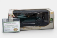 CLEVELAND: A Signature models 1:18 scale 1920 Cleveland roadster model, finished in a dark green body with black mudguards paintwork with black interior, packaged in the Crawford museum packaging, model number 18119