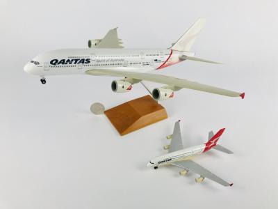 QANTAS AIRBUS A 380: 2 Models (longest 36cm): A 1:200 scale resin model registration 'VH-OQA' on stand with wheels and A 1:500 scale metal model on wheels, registration 'VH-OQA'