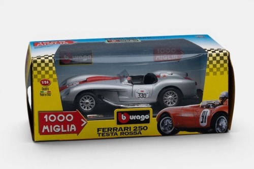 FERRARI: A Bburago 1:24 scale 1957 Ferrari 250 Testa Rossa model, the number 330 race car in rally livery, finished in silver with a red stripe paintwork with black interior, part of the 1000 Miglia collection, model number 1207
