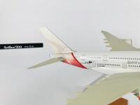 QANTAS AIRBUS A 380: 2 Models (longest 36cm): A 1:200 scale resin model registration 'VH-OQA' on stand with wheels and A 1:500 scale metal model on wheels, registration 'VH-OQA' - 3