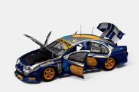 FORD: A 1:18 scale Classic Carlectables model car, this is a Ford AU Falcon as raced during the 2002 V8 supercars championship season, the number 10 Mark Larkham, Orrcon liveried race car, limited edition 713/1000 pieces produced, model number 18041 - 5