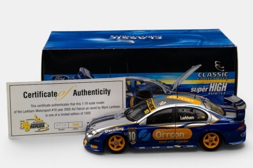 FORD: A 1:18 scale Classic Carlectables model car, this is a Ford AU Falcon as raced during the 2002 V8 supercars championship season, the number 10 Mark Larkham, Orrcon liveried race car, limited edition 713/1000 pieces produced, model number 18041
