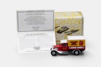 FORD: A Matchbox collectibles model, of a 1932 Ford model "AA" van, finished in red/white paintwork with a Coca-Cola livery, model number YYM96507