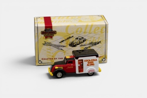 366 · DODGE: A Matchbox collectibles model, of a 1937 Dodge airflow delivery van, finished in red/black paintwork with a Coca-Cola livery, model number YYM96505