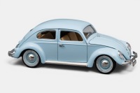 VOLKSWAGEN: A Bburago 1:18 scale Volkswagen Kafer Beetle model, finished in light blue paintwork with cream interior, part of the gold collection, model number 3381 - 2